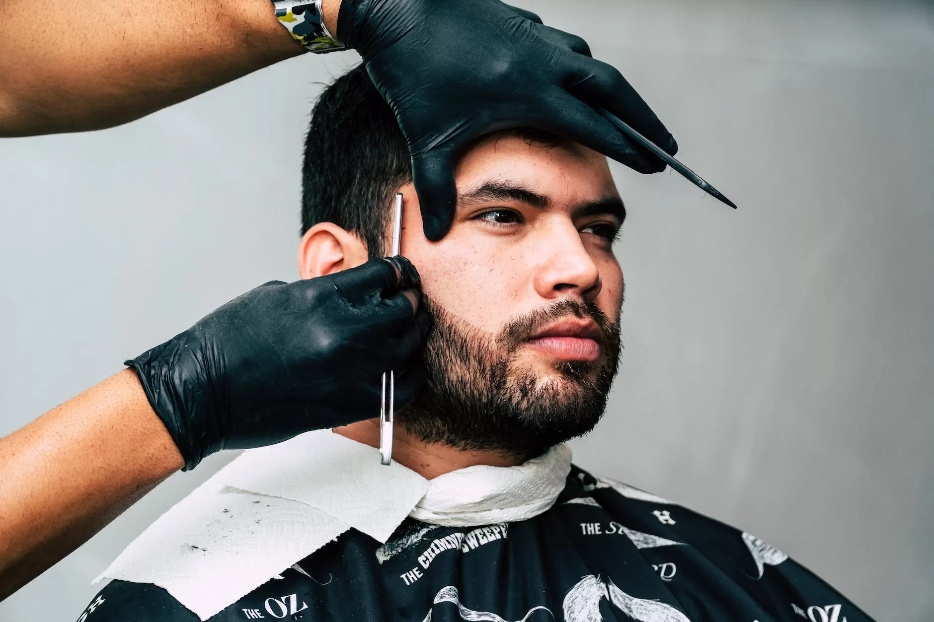 man taking beard shave